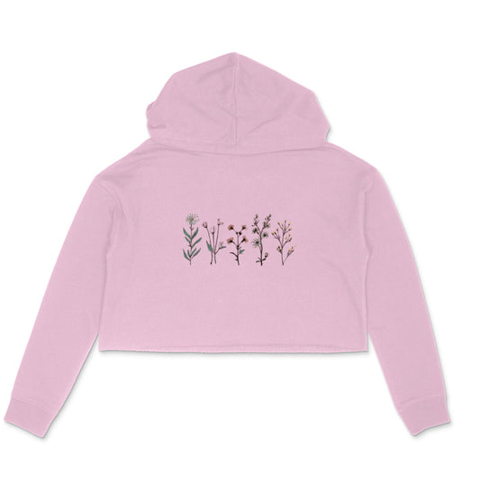 Pink hoodie with floral designs on the back against a white background