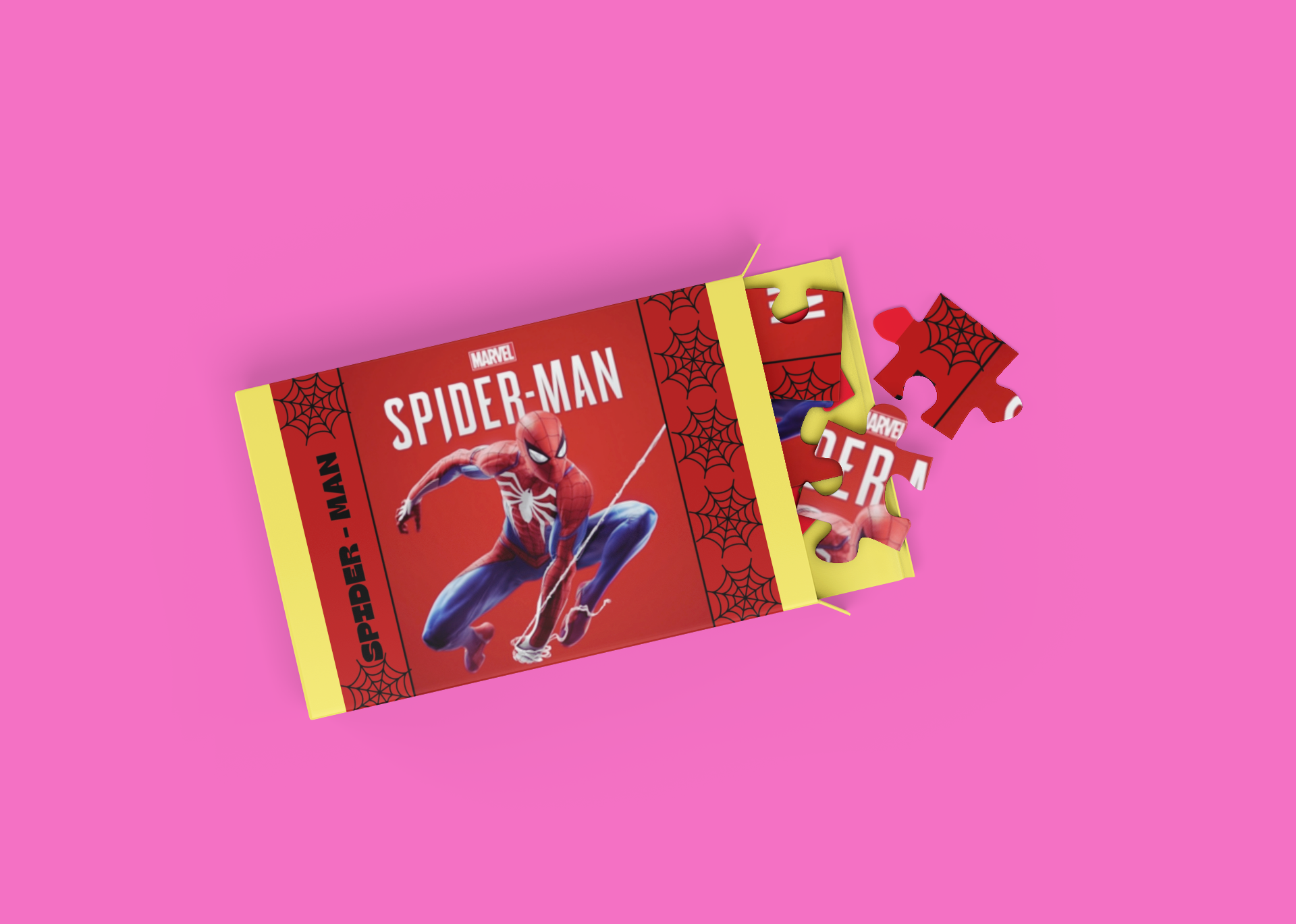 Spider-Man puzzle with packaging on a pink background